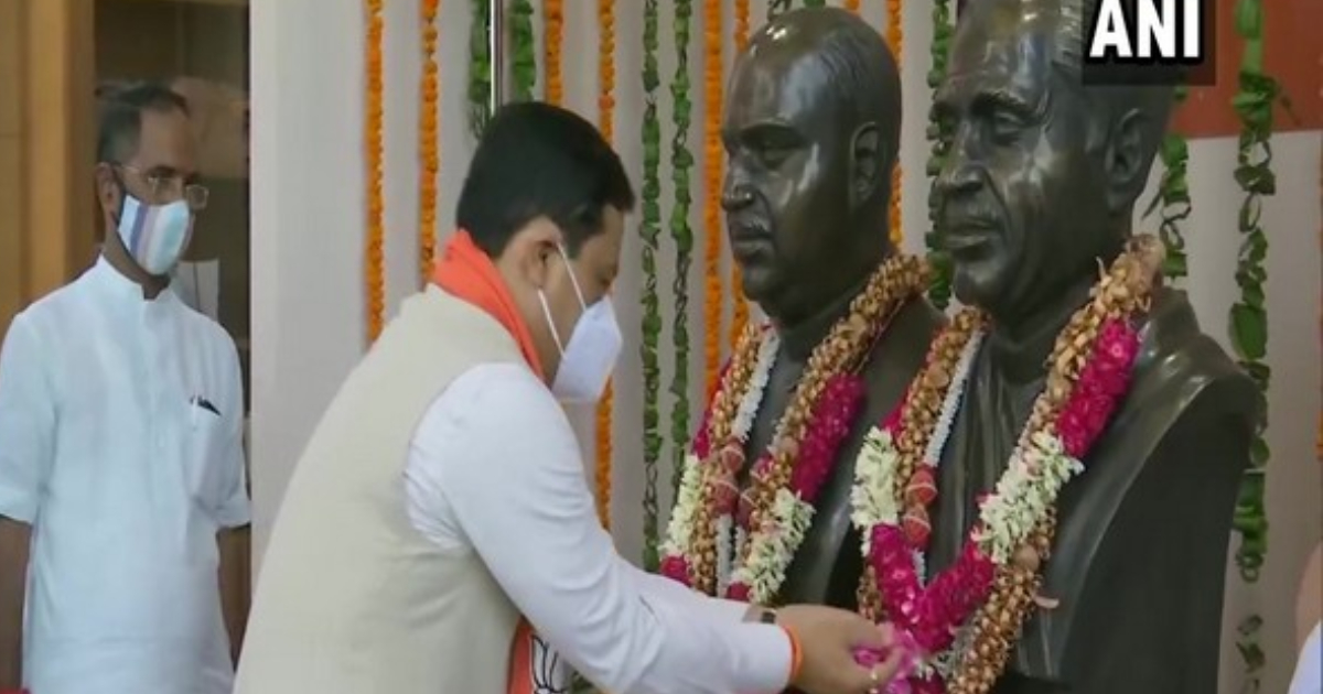 Sonowal pays floral tribute to Pt Deen Dayal Upadhyaya, Syama Prasad Mookerjee at BJP headquarters